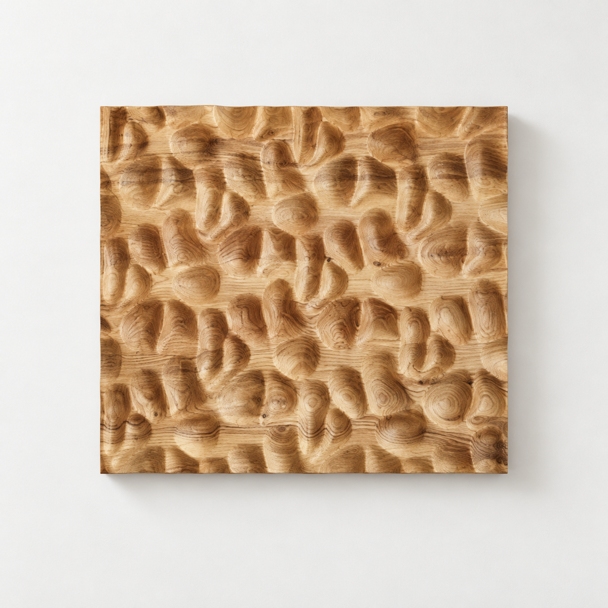 3D Carved Wood Wall Art: Textured Wood Panel Hanging — front view on a light grey-white wall with a natural shadow