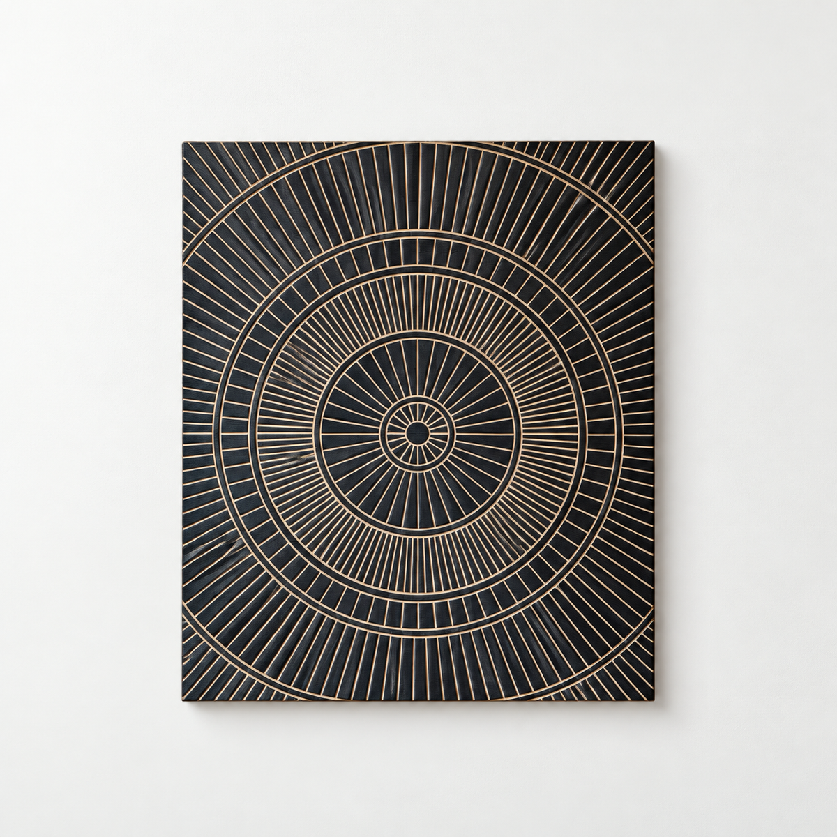 Hand-Carved Wood Line Art: Geometric Wall Hanging - Black & Gold — front view on a light grey wall with a natural shadow