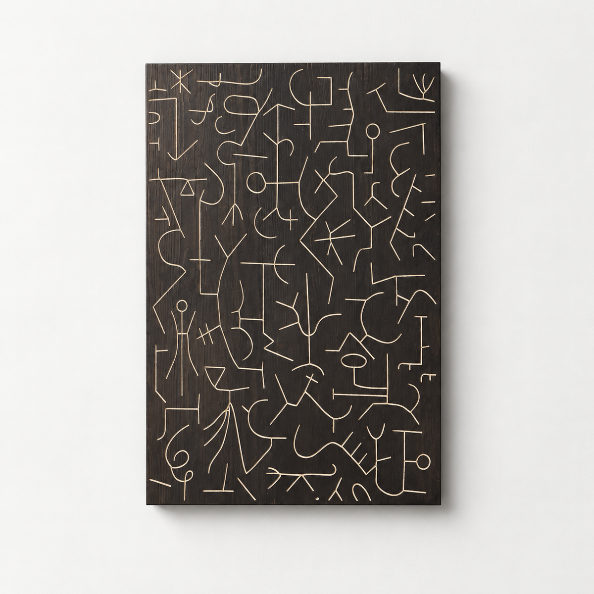 Carved Minimalist Wood Wall Art — front view on a light grey-white wall with a natural shadow