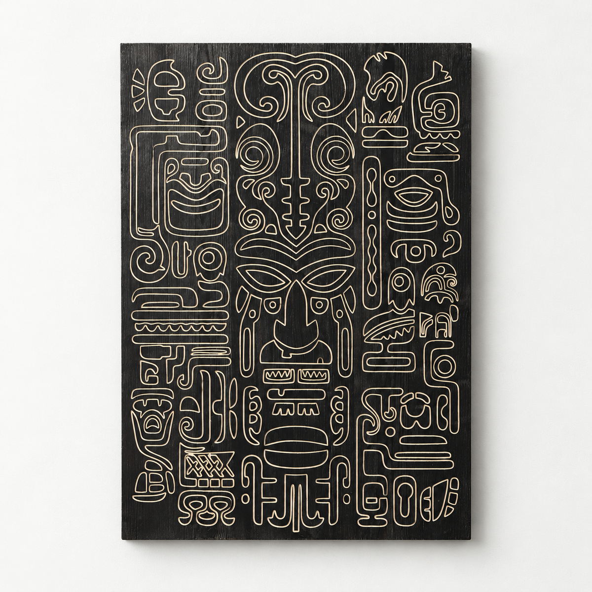 Minimalist Antique Aztec Design Carving on Wood, Wall Decor, Boho Wall Art — front view on a light grey-white wall with a natural shadow